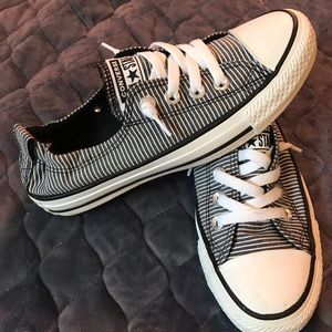 Black and white striped slip on converse shoes